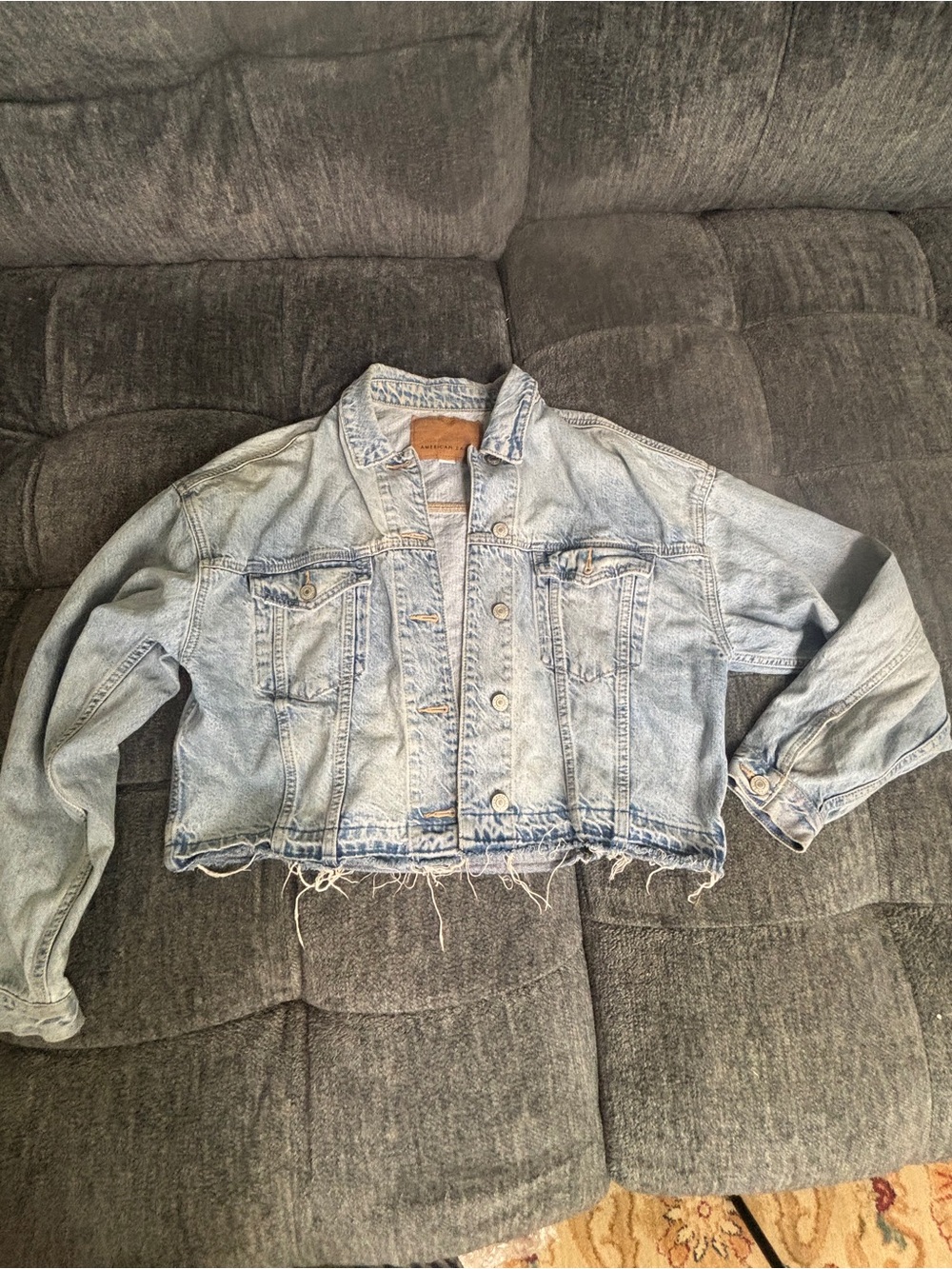 American Eagle Outfitters Light Blue Cropped Denim Jacket with Frayed Hem